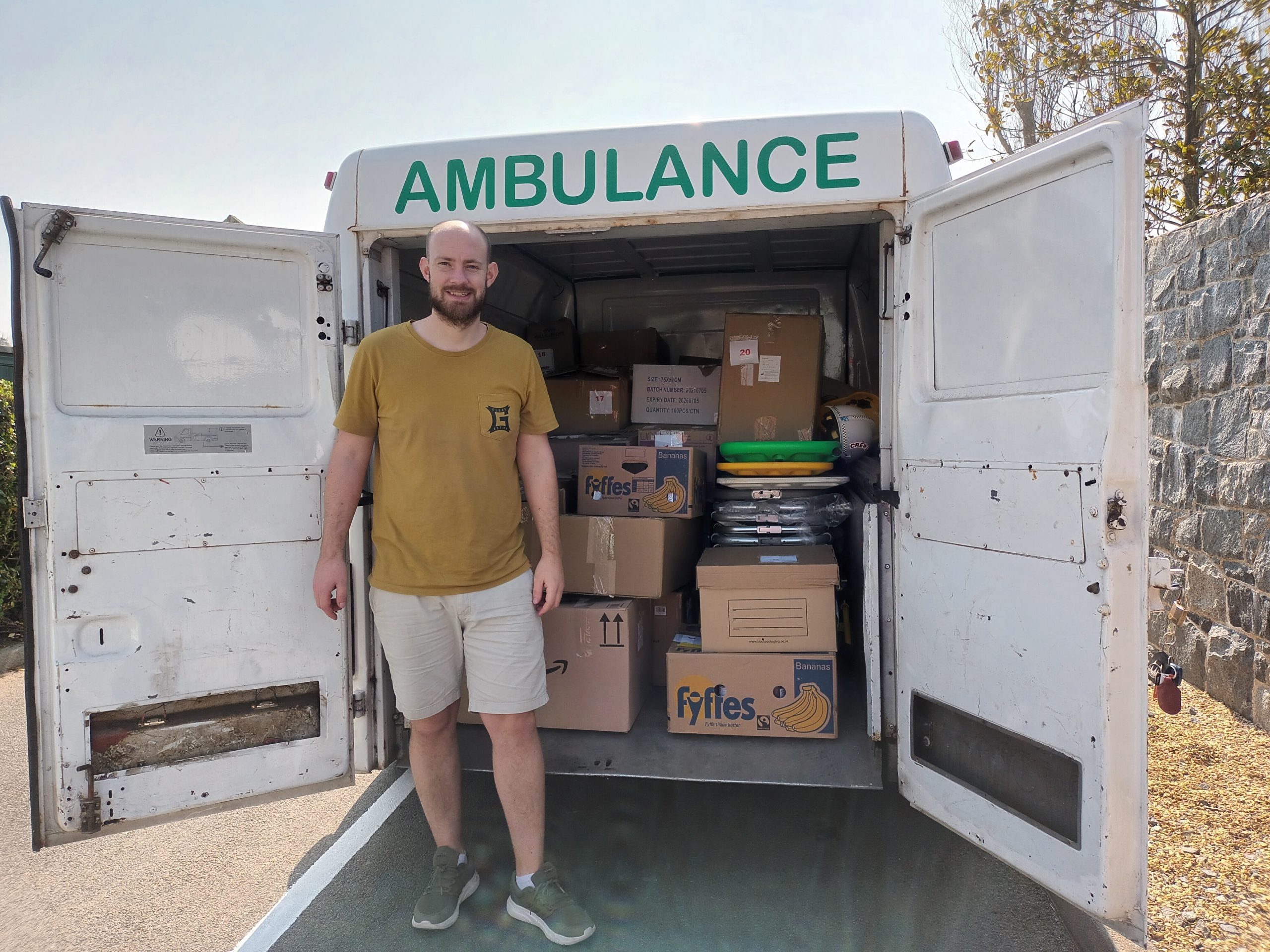 Darren Konken stood next to Ukraine ambulance 