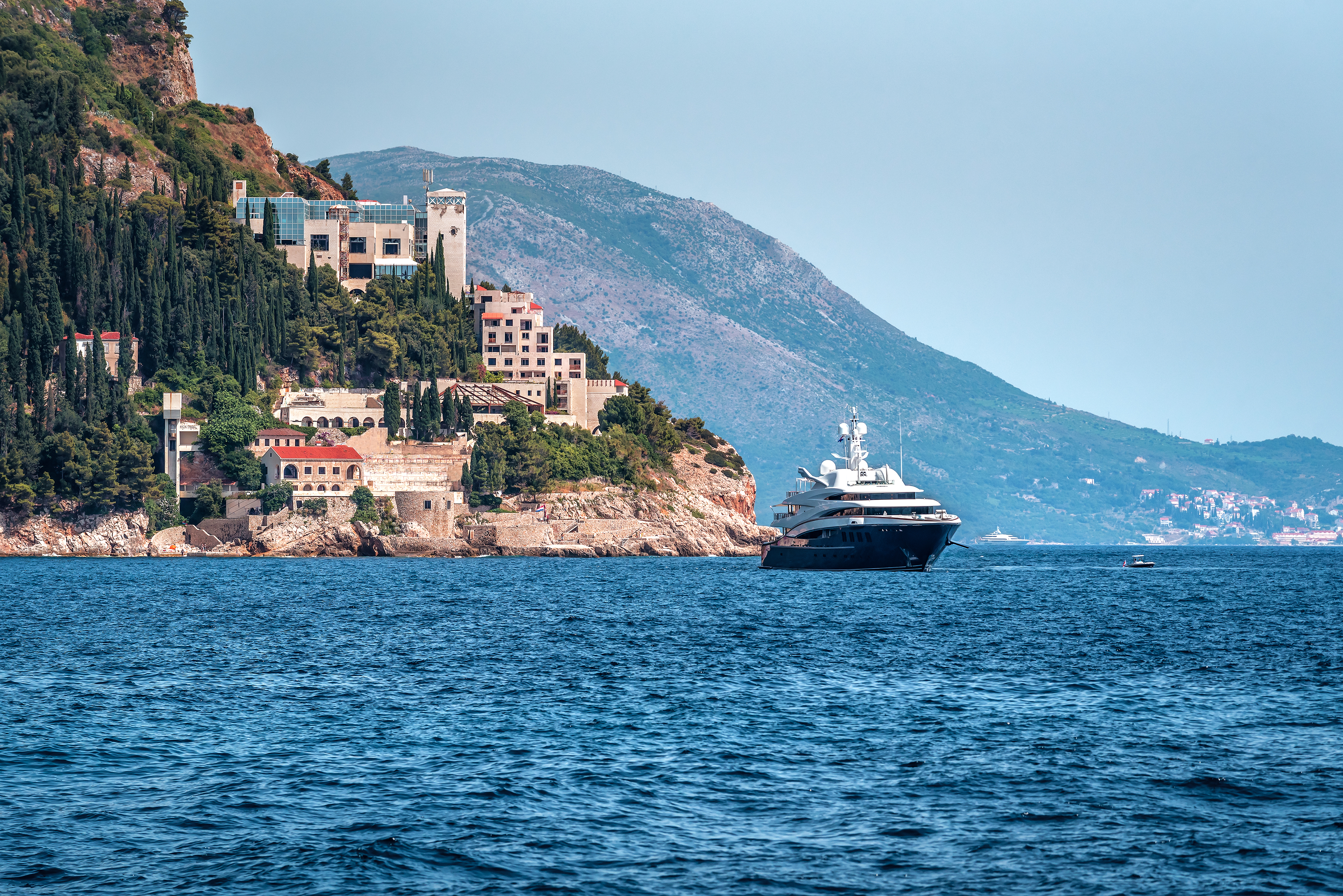 Yacht At Sea Off The Coast