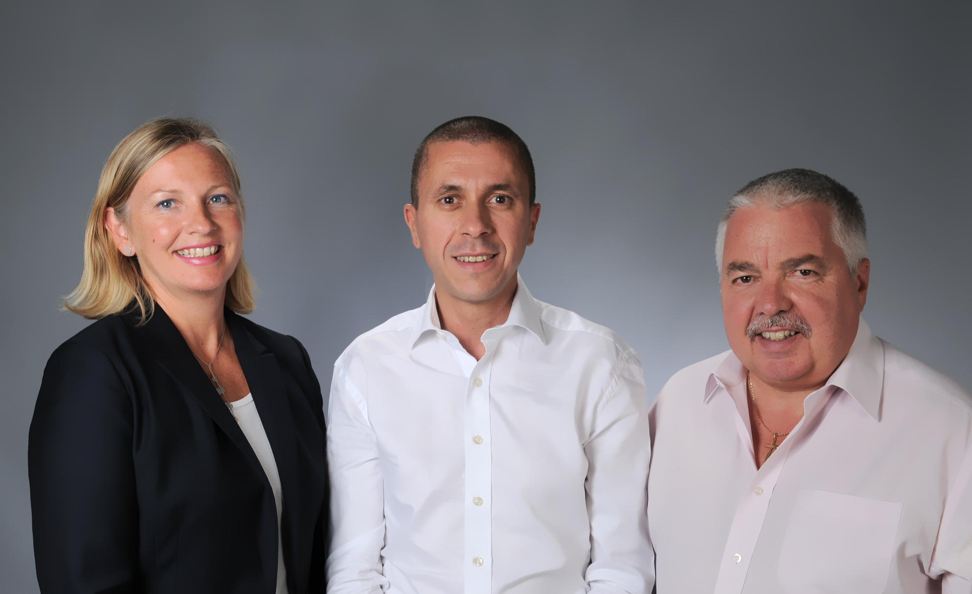 Caroline Bennett-Akkaya, Hakim Berhoune, and Martyn Crespel standing side by side for a professional photo